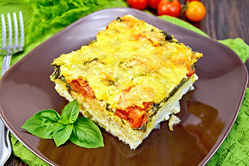 Image showing Pie potato with tomato and basil on board