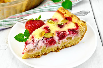 Image showing Pie strawberry-rhubarb with sour cream on light board