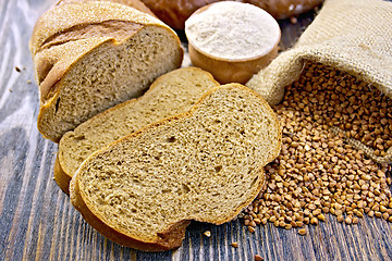 Image showing Bread buckwheat with cereals and flour on board