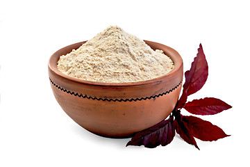 Image showing Flour amaranth in clay bowl with purple flower