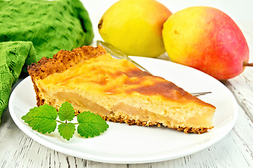 Image showing Pie pear with sour cream on light board