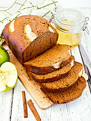 Image showing Bread apple with cinnamon on light board