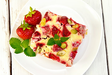 Image showing Pie strawberry-rhubarb with sour cream on plate
