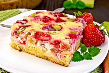 Image showing Pie strawberry-rhubarb with sour cream on napkin