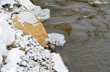 Image showing Ice and water from a rusty pipe