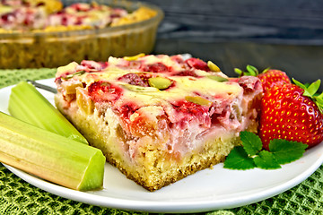 Image showing Pie strawberry-rhubarb with sour cream on board