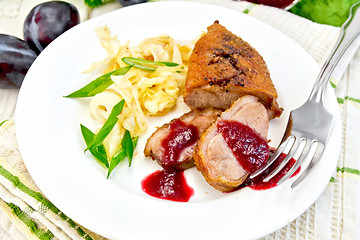 Image showing Duck breast whole cabbage and green onions in plate