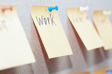 Image showing Work written on a sticky note