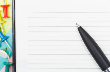 Image showing Notepad with pen and pushpins