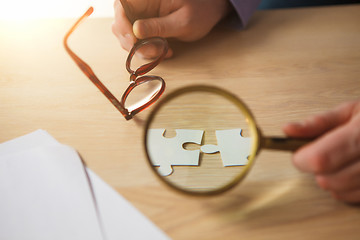 Image showing Building a business success. The hands with puzzles