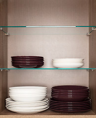 Image showing clean white and brown dishes 