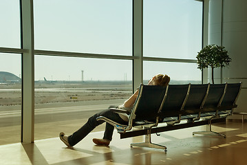 Image showing Lonely girl waiting in airport