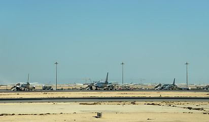 Image showing Desert airport strip with airplanes