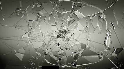 Image showing Pieces of cracked glass on white