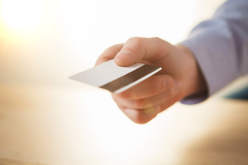 Image showing The male hand showing credit card