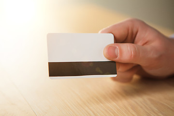 Image showing The male hand showing credit card