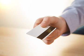 Image showing The male hand showing credit card