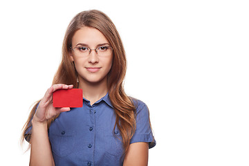 Image showing Confident business woman in glasses showing blank credit card