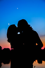 Image showing Silhouette of a couple at sunset