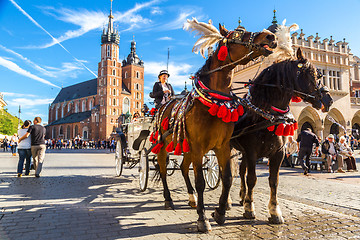 Image showing Horse carriages at main square in Krakow