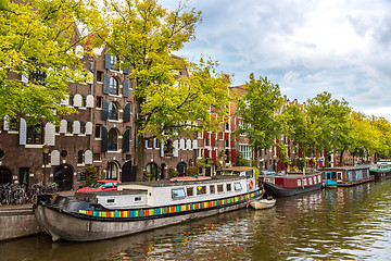 Image showing Amsterdam canals and  boats, Holland, Netherlands.