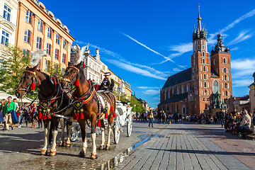 Image showing Horse carriages at main square in Krakow