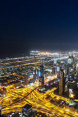 Image showing Dubai downtown night scene with city lights,