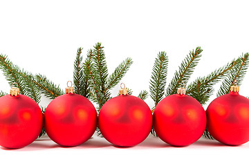 Image showing red Christmas balls and fir branch