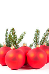 Image showing red Christmas balls and fir branch