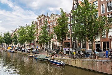 Image showing Amsterdam canals and  boats, Holland, Netherlands.