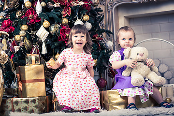 Image showing baby girls with christmas present