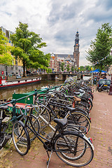 Image showing Bicycles on a bridge over the canals of Amsterdam