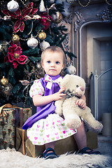 Image showing baby girl with christmas present