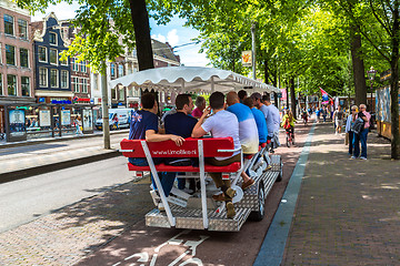 Image showing People riding bicycles in Amsterdam