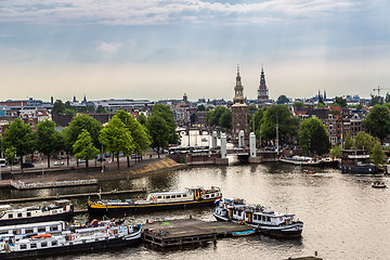 Image showing Amsterdam canals and  boats, Holland, Netherlands.