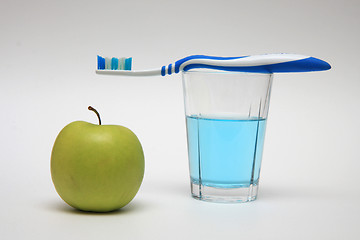 Image showing Apple and Toothbrush