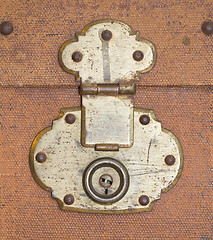 Image showing Old canvas trunk lock close up