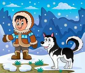 Image showing Inuit boy with Husky dog