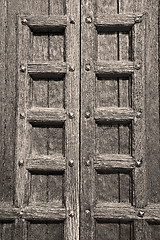 Image showing door    in italy old ancian wood and traditional  texture nail