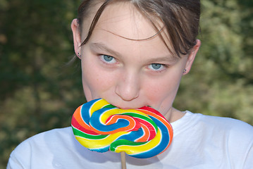 Image showing teenager with lollipop