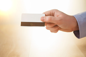 Image showing The male hand showing credit card