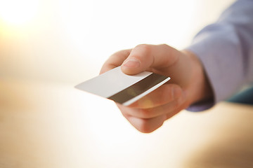 Image showing The male hand showing credit card