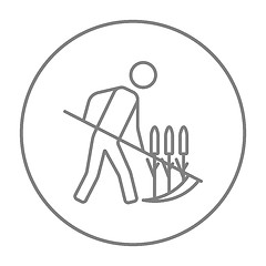 Image showing Man mowing grass with scythe line icon.