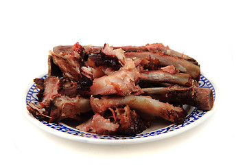 Image showing bones from smoked pig ribs 