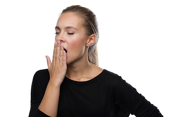 Image showing Beautiful woman yawns of boredom 