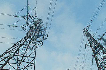 Image showing Big frosty power lines among winter.