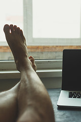 Image showing Man took a break from work 