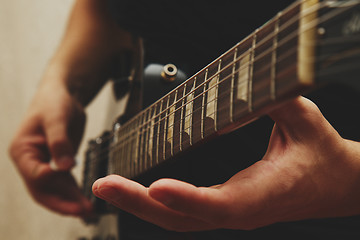 Image showing Man playing on guitar