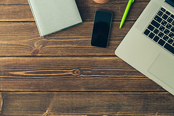 Image showing Laptop and diary on the desk