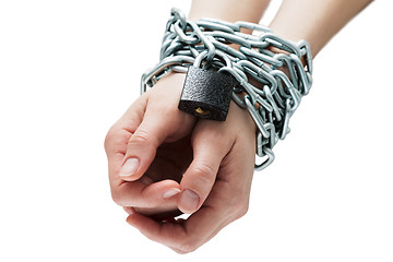 Image showing Social theme: hands tied a metal chain on a white background